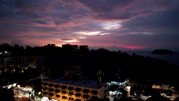 Purple Sunset with a View of the Sea and Clouds