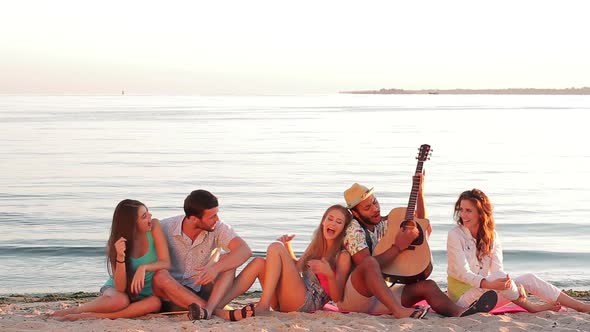 People on Beach Are Smiling.