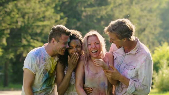 Laughing Faces of Soaking Wet Excited Friends Celebrating Holi Color Festival