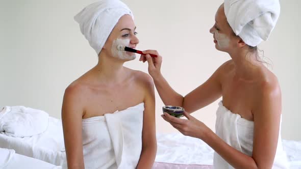 Beautiful Woman Having a Facial Treatment at Spa