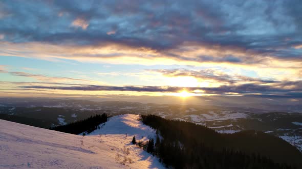 Aerial View in Sundown Winter Mountain