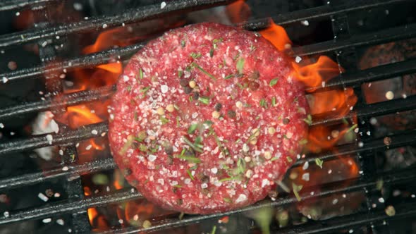 Super Slow Motion Top Shot of Seasoning Falling on Fresh Minced Meat at 1000 Fps