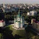 Aerial View of St. Andrews Church, Orthodox Church on Green Hill in the City - VideoHive Item for Sale