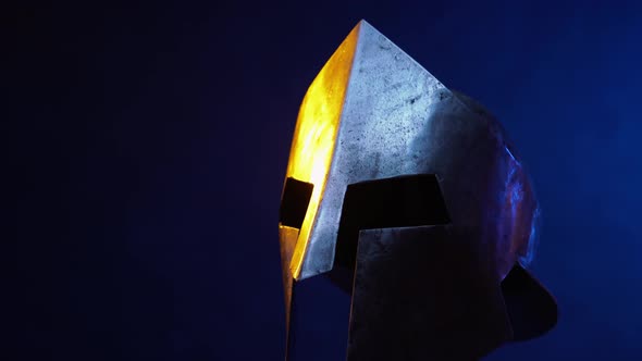 Old Spartan Helmet Isolated on Blue