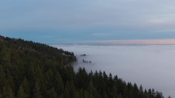 View of Canadian Nature Mountain Landscape covered in cloud and fog. West Vancouver, British Columbi