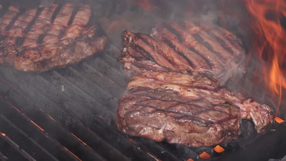 Searing and smoking ribeye steaks on grill