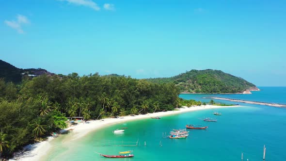 Aerial top view sky of idyllic resort beach time by shallow sea and bright sand background of a dayo