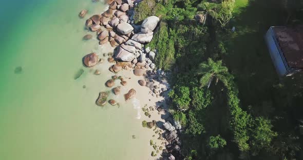 Top Aerial view of Beautiful beach full of vegetation. Drone Tropical Seascape