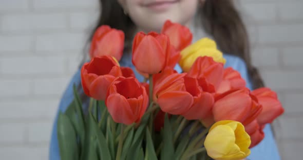 An armful of flowers. 