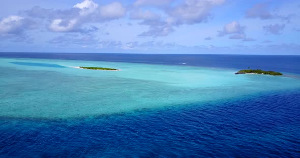 Wide above abstract view of a summer white paradise sand beach and aqua turquoise water background i