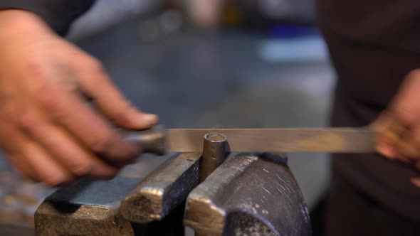 Iron Rasping Worker Close Up Hand