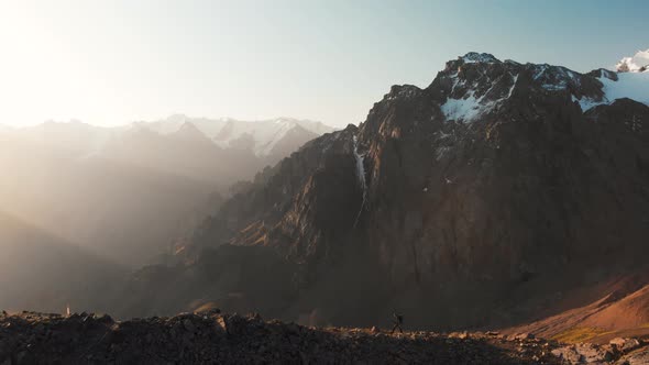 Hiker Walking at Beautiful Mountain Landscape Aerial Shot