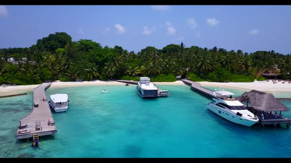 Aerial drone view tourism of tropical shore beach break by blue ocean with white sand background of 