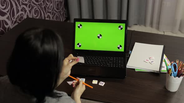 Woman Teacher Making Online Distance Education Video Call on Laptop Green Screen