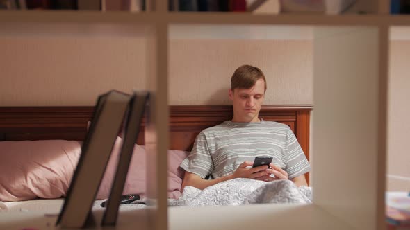 Serious Man With Smartphone