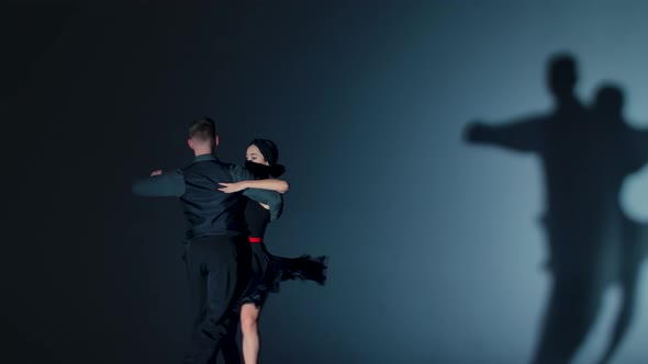 Tango Dance Performed By Pair of Ballroom Dancers
