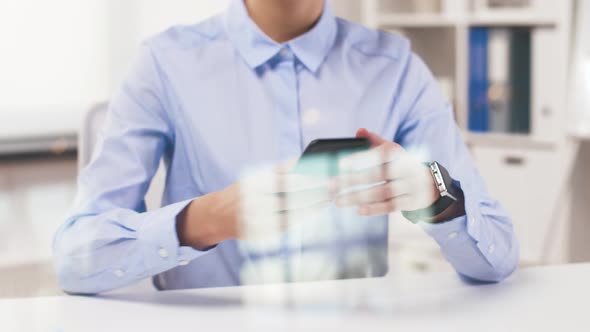 Businesswoman with Smartphone and Smart Watch 69