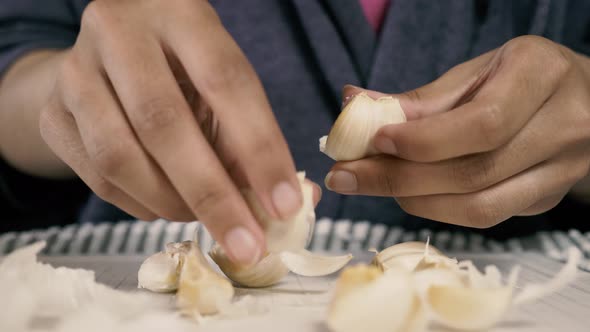 Peeling garlic cloves