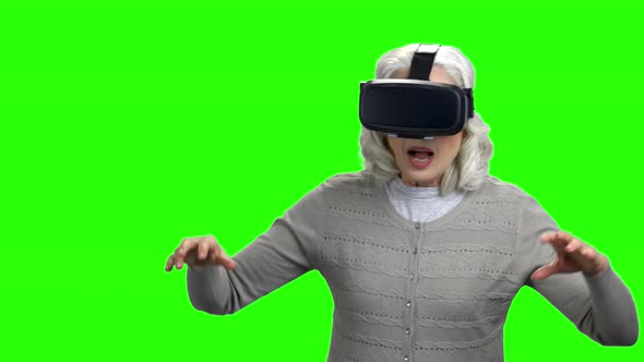 Old Woman Wearing Virtual Reality Headset