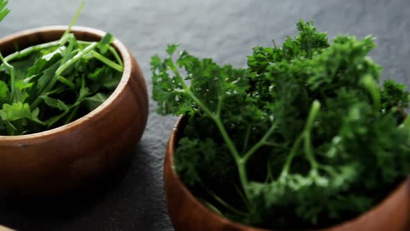 Bowls of shredded cabbage and herbs