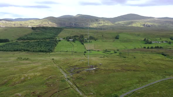 Aerial View of Transmitter Tower on an Agricultural Field in the Irish Highlands By Glenties in