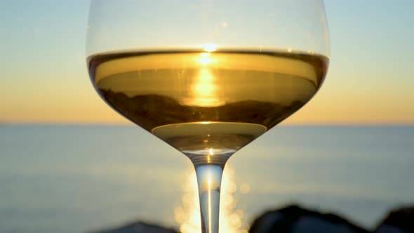 White Wine in Glass Against the Sea