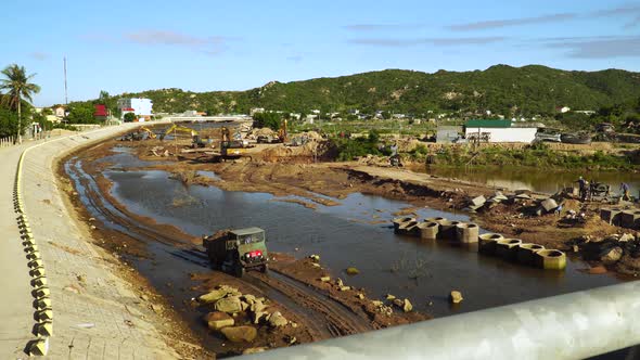 Scene of construction of riverbed in Vinh Hy, Vietnam. Static