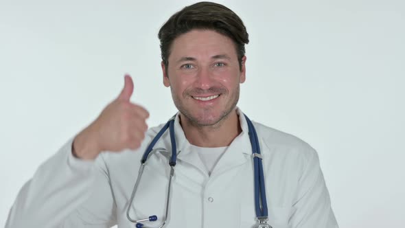 Thumbs Up By Male Doctor, White Background