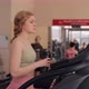 Woman Walking on a Treadmill in Gym - VideoHive Item for Sale