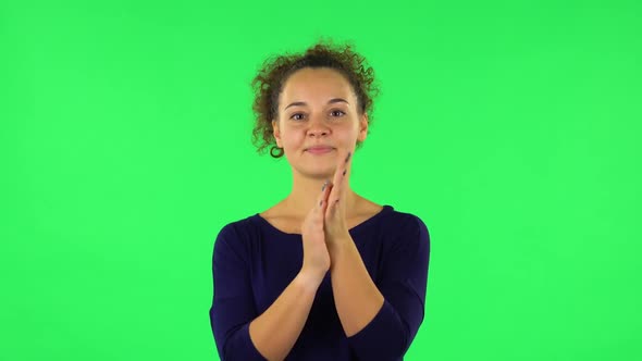 Portrait of Curly Woman Claps Her Hands. Green Screen