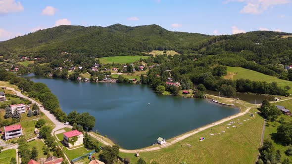 Aerial view of a lake in the village of Bansky Studenec in Slovakia