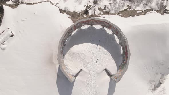 Gudauri, Georgia - April 12, 2021: Aerial view of Russia–Georgia Friendship Monument