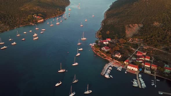 Aerial view of boats anchored at bay during the sunset, Croatia.