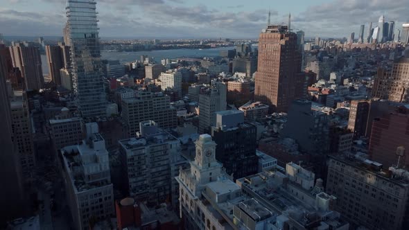 Forwards Fly Over Buildings in City