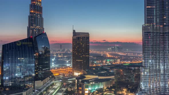 Dubai Downtown Street with Busy Traffic and Skyscrapers Around Timelapse