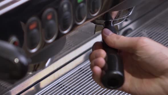 Coffee Machine Making Double Espresso in Paper Cup.