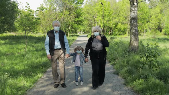 Family of Grandparents Takes Off Medical Masks After Coronavirus Quarantine End