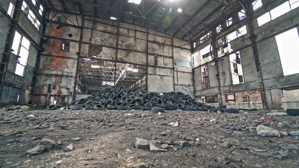 Empty Storehouse Interior For Background. Industrial abandoned building interior in dark colors