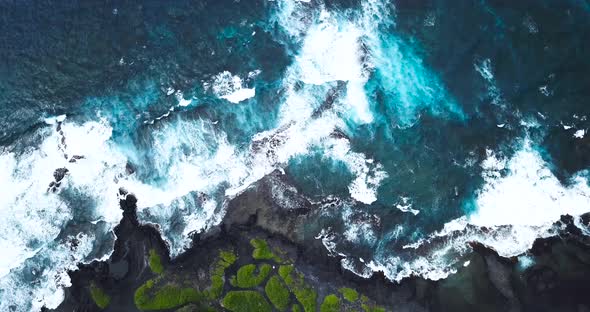 The Big Island of Hawai'i housing beautiful contrasts of black, green and blue, all shown from above