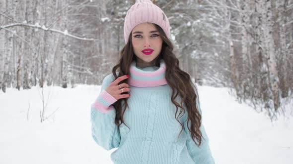 Stylish Young Woman Walking Towards Winter Forest