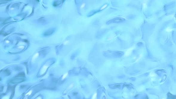 Super Slow Motion Abstract Shot of Waving Blue Clear Liquid Background at 1000Fps