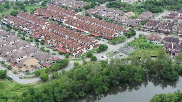 Aerial drone flying around Venice of Perak, Manjung, Malaysia, capturing wide array of residential h