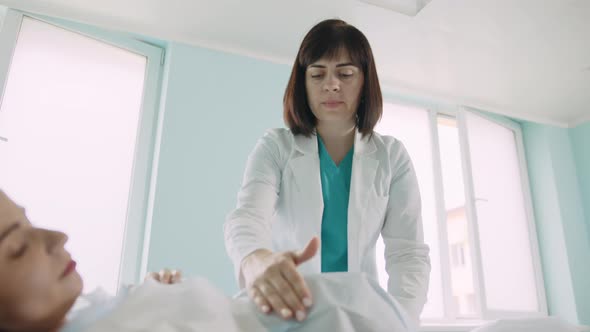 Medical Worker Supporting Pregnnat Woman Before Labour