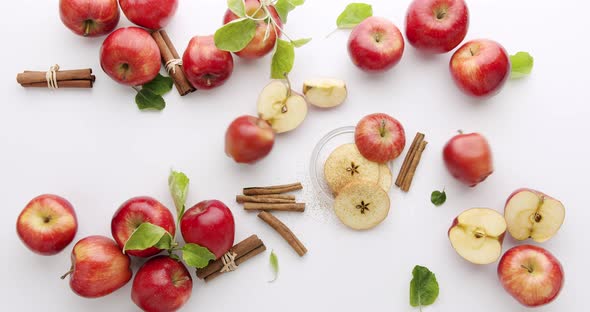 Red Natural Apples with Slice and Leafs Cinnamon Concept on White Background