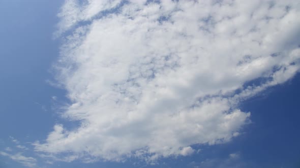 Cumulus Clouds Against the Blue Sky