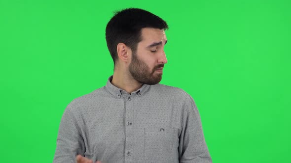 Portrait of Brunette Guy Focused Thinking About Something, No Idea. Green Screen