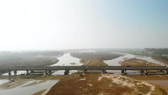 View of the busiest bridge all over the Punjab constructed on river.