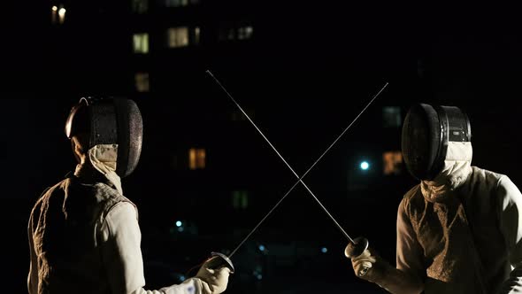 Portrait Of Young Fencer Man Looking Into Camera Indoors.