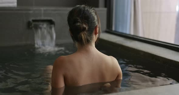 Woman enjoy Japanese onsen