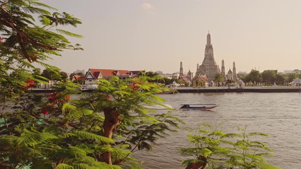 Thailand Bangkok Sunset River City Scene, Tourist Boat Trip Water Taxi and Buddhist Temple of Wat Ar